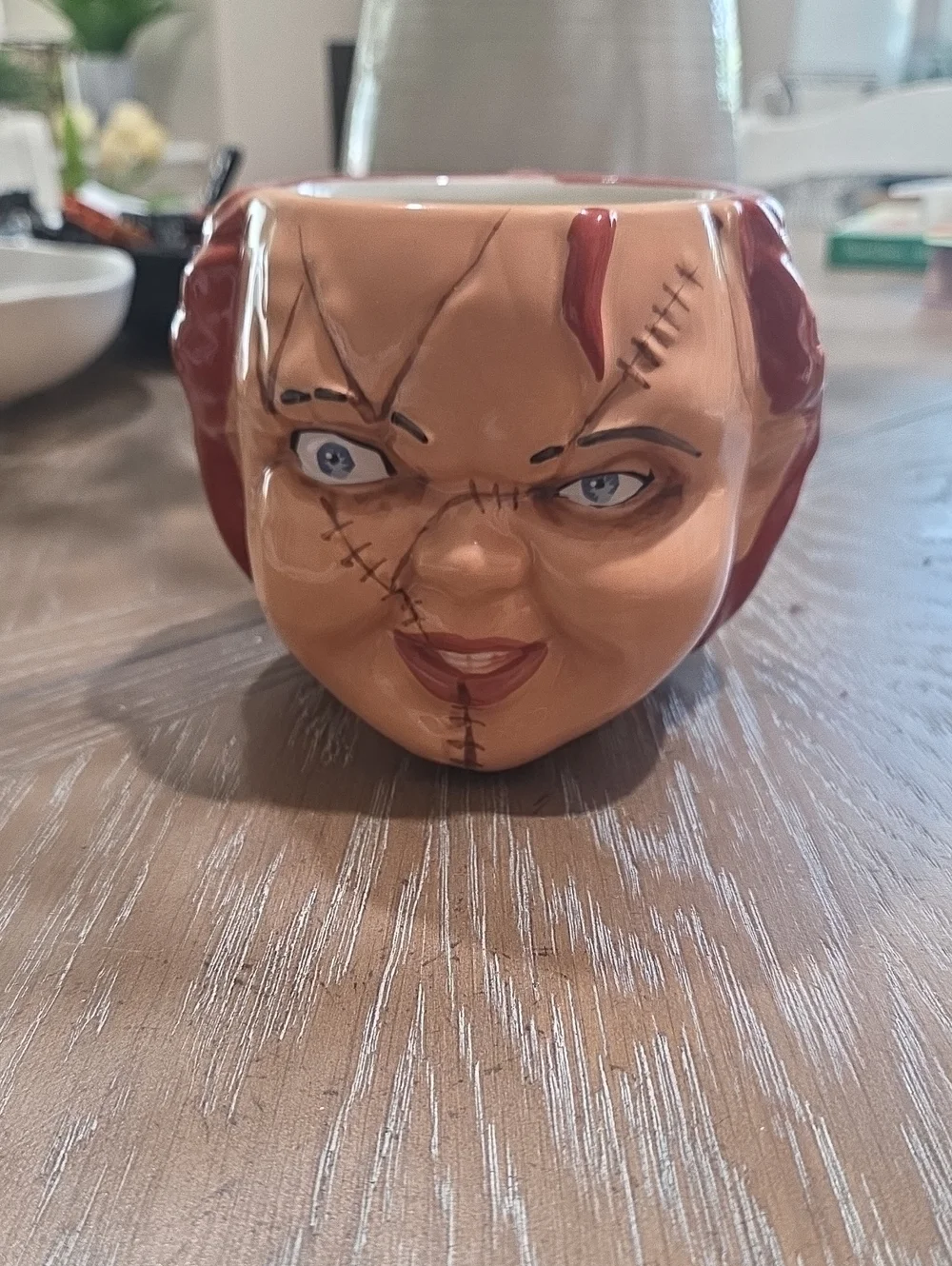 Novelty Horror Doll Face Ceramic Mug in Brown and Red -